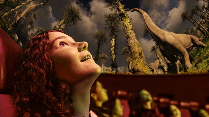 A visitor enjoying a ‘Fulldome Flick’ in the Melbourne Planetarium. 