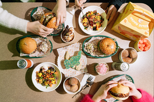Aerial via of a table laden with all the varieties of food at Dino Bites.