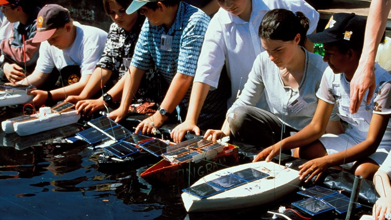 Students prepare for their solar powered boat race