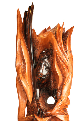 Wooden sculpture of Waa the crow