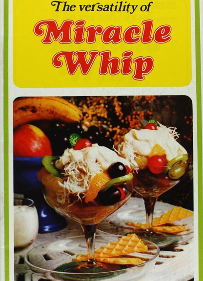 A brochure titled 'The versatility of Miracle Whip', including a photograph of fruit salad with Miracle Whip on top.