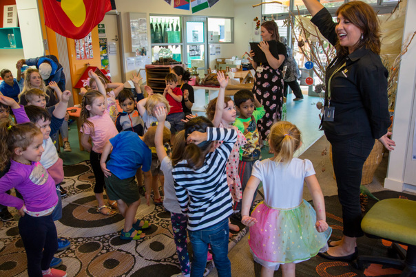 Outreach Program Presenter, presenting the fossil program to kindergarten children.