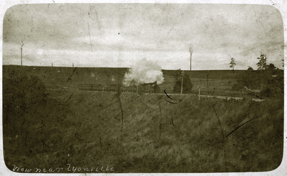 A steam locomotive hauling a mixed train, Lyonville district, circa 1910
