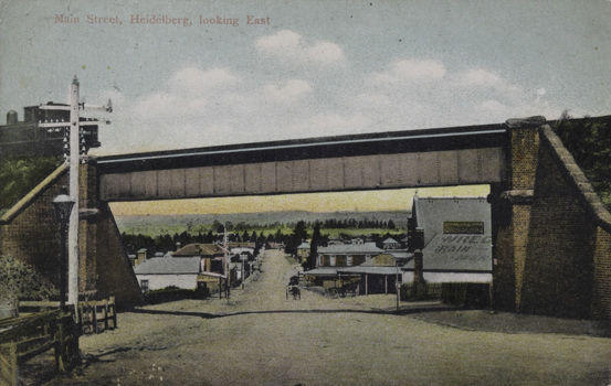 A steam locomotive crossing a rail bridge, Heidelberg, post-1910