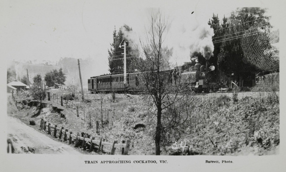 A steam train hauling passenger carriages, Cockatoo, pre-4 June 1935