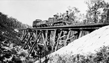 A train crossing the Mundic Creek rail bridge