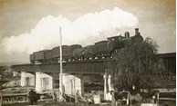 A steam locomotive crossing the Tambo River Bridge on the Bairnsdale to Orbost line, Bairnsdale, 1914