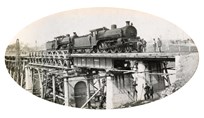 Two 117t A2 class steam locomotives stopped on the bridge over the Nicholson River on the Bairnsdale to Orbost line, 1915