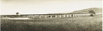 Sandy Creek Bridge, Wodonga to Tallangatta deviation, Lake Hume district, 1932. The bridge appears to curve but this may be a photographic distortion.