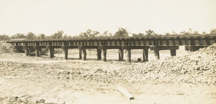An open deck bridge (with sleepers laid directly over steel girders) replacing a culvert at the scene of a washway, Yarrawonga, circa 1931