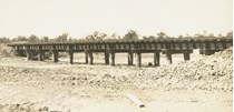 An open deck bridge (with sleepers laid directly over steel girders) replacing a culvert at the scene of a washway, Yarrawonga, circa 1931