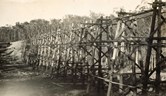 Rail bridge construction over Stony Creek on the Bairnsdale to Orbost line, Bairnsdale district, 1914-15. The piers are in place and braced but the girders are still to be added.