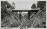 Bridge spanning an embankment and a single track railway line, Upwey, post-1945