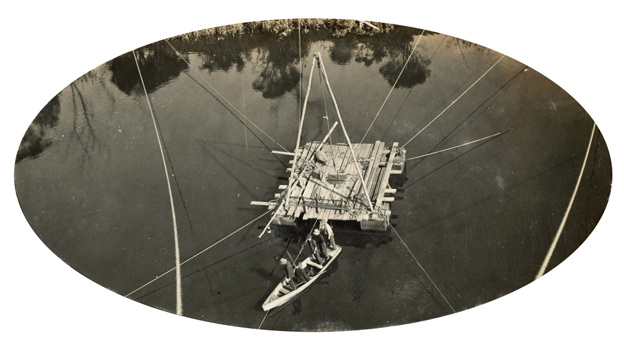 Bridge over the Nicholson River, Bairnsdale to Orbost line. A timber raft used as a work platform for sinking a bore to test sediment below the river bed of the Nicholson River, circa 1910