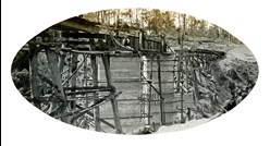 Boggy Creek Bridge on the Bairnsdale to Orbost line, circa 1915. Central piers of the bridge are in place.
