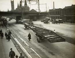 A girder on jinkers, during the construction of the Spencer Street Bridge, circa 1930