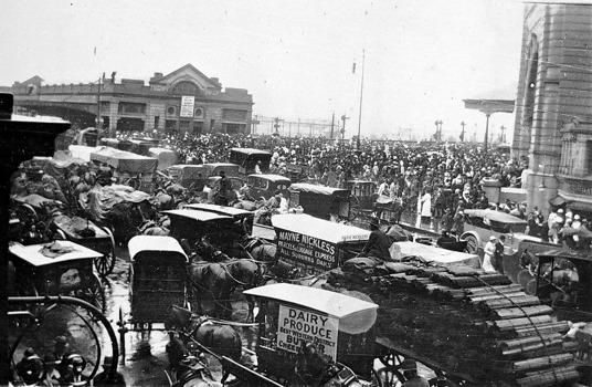 The crowded intersection outside Flinders Street and Princes Bridge Stations, Melbourne, circa 1925