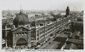 Flinders Street Station and the Yarra River, with Sandridge and Queens Bridges in the background, circa 1920