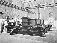 Interior of Victorian Railways electric power station at Spencer Street which supplied power for electric lighting in Spencer Street Station and railway yards and the Victorian Railways administration building. Shows four Parsons 150 kW turbo-alternator sets installed in 1898, which supplied DC power for electric lighting through Ferranti rectifiers.