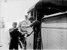 Station and train staff exchanging electric