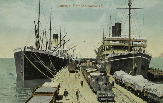 Goods train at Port Melbourne Pier, circa 1911. Liners are moored on either side of the pier.