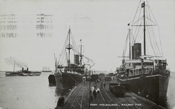 Rail trucks and two large ships berthed at Railway Pier (Station Pier), Port Melbourne, pre-5 November 1923