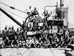 Workers on Railway Pier in front of a steam crane, Geelong, 4 December 1928