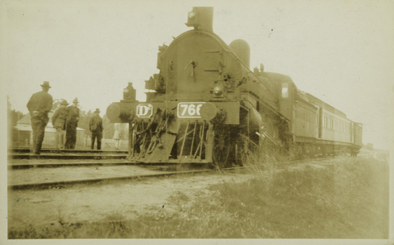 Steam locomotive D2 766 with passenger carriages attached, circa 1920