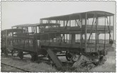 Livestock freight carriages, apparently damaged, circa 1930