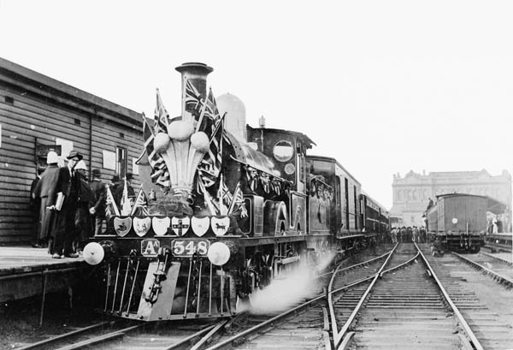 AA class steam locomotive no. 548 decorated for a visit by the Duke and Duchess of Cornwall and York to open the Australian Parliament, May 1901