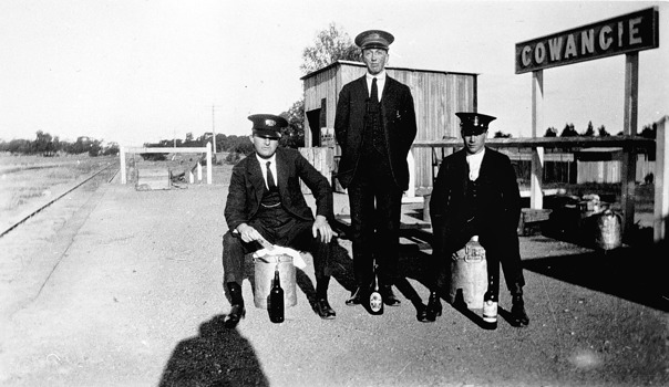 Station staff with bottles of beer, Cowangie Station, circa 1925