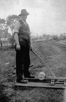 Staff member operating a point lever, Moe, circa 1926