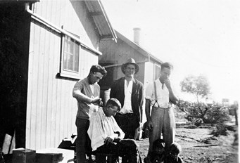 Hair cutting at the railway fettlers' huts, Hattah, 1932