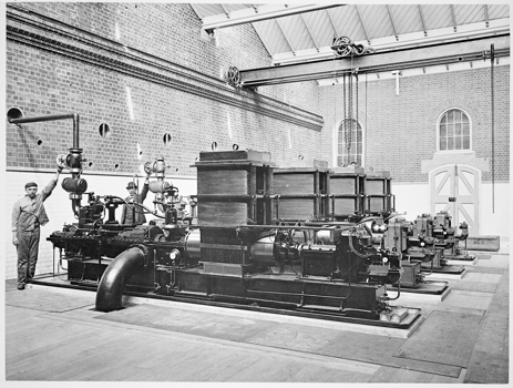 Staff inside the Victorian Railways electric power station, which supplied power for electric lighting in Spencer Street Station and railway yards and the Victorian Railways administration building, Spencer Street, Melbourne, circa 1898