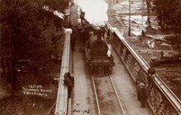 A DD class (DD 636) steam locomotive passing over and testing the road and rail bridge over the Murray River, Tocumwal, on the Strathmerton to Tocumwal line, July 1906