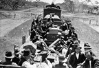 Workers in rail trucks returning home for Christmas, Millewa district, 1924
