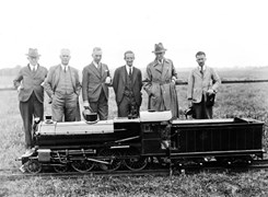 Commissioners with a model steam engine