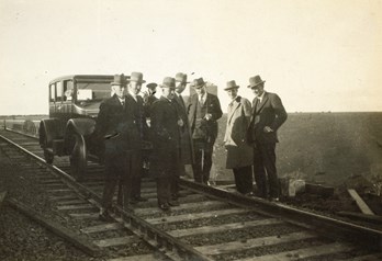 Staff, including Chief Engineer Charles Perrin, inspecting construction of the Maribrynong River Viaduct on the Albion to Broadmeadows line, circa 1928-29