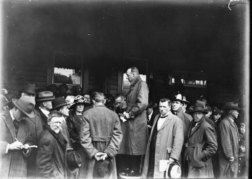 Harold Clapp addressing a crowd gathered for the opening of electric services to Ferntree Gully