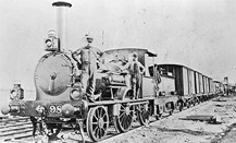 Staff with D class steam locomotive no. 98, 1870