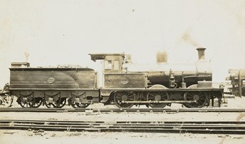 Steam locomotive with number 34 handwritten on the engine, circa 1910