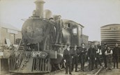 V class steam locomotive no. 499 with station staff and loco crew at Port Albert Railway Station, 1912