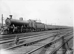 N class steam locomotive no. 121 hauling a coal train, Melbourne rail yard