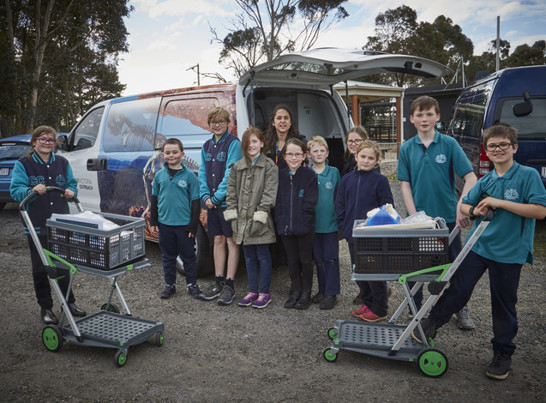 Children with museum van