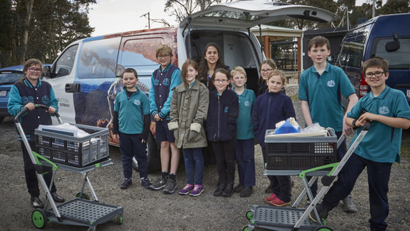 Children with museum van