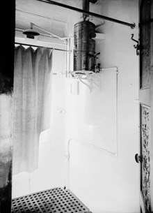 Shower in state carriage showing a rapid gas hot water heater