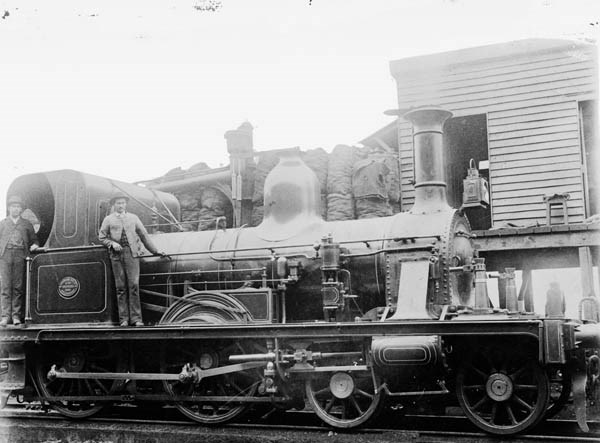 C class steam locomotive at coal stage, circa 1890s