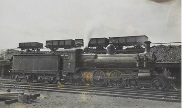 Dd class locomotive at coal stage, unknown location, post-1910