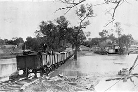Train traversing the flooded Murray River, Mildura, circa 1924