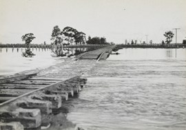 Floods washing over the Yarrawonga to Oaklands line, Yarrawonga, 1931